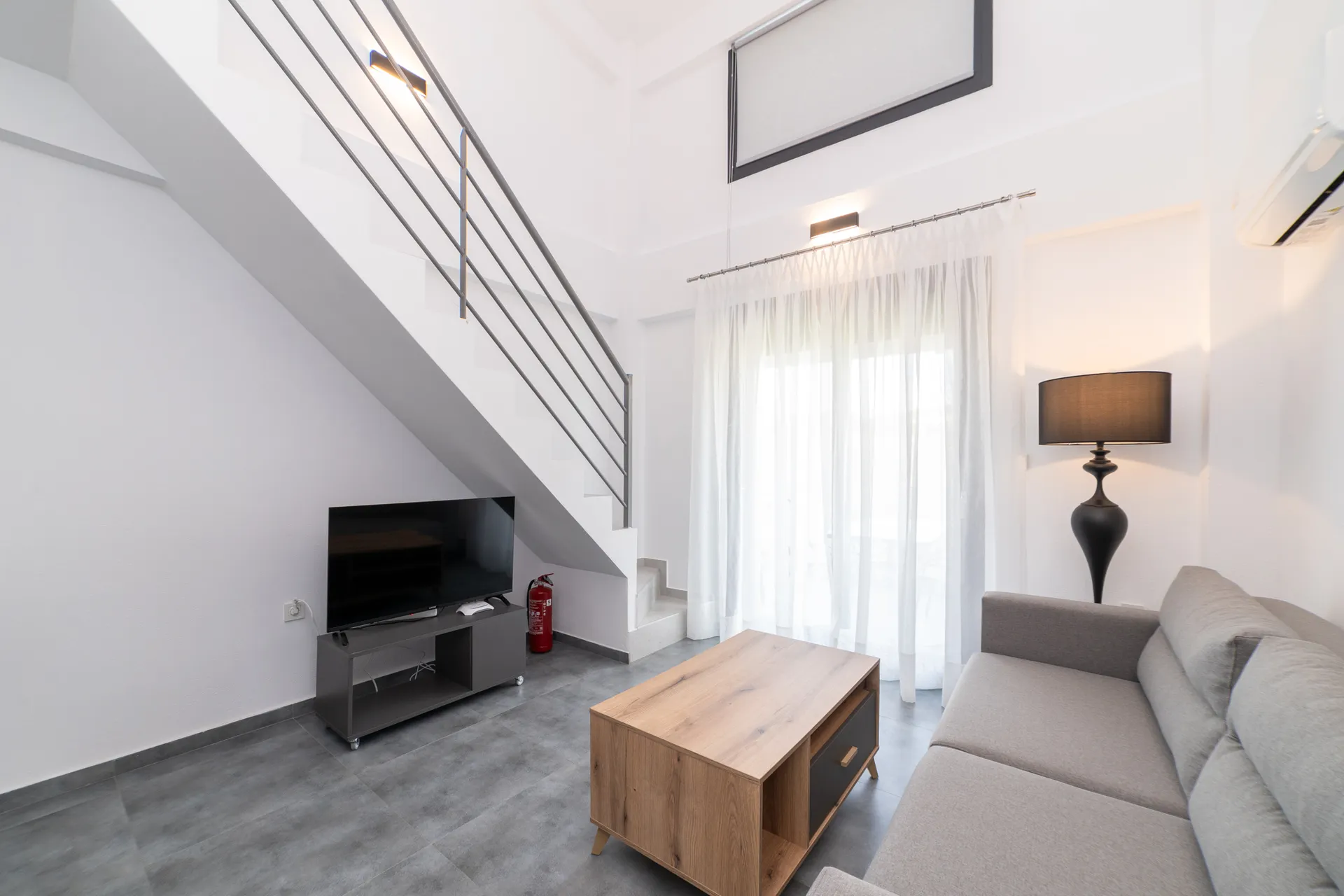 Tiara Holidays - Olympiada Residential Complex & Villas - Two Bedroom Loft - living room.webp